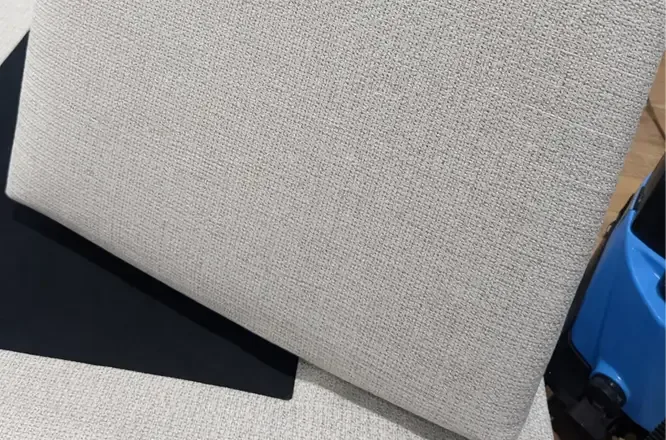 Close up of a fabric couch cushion restored to clean after deep steam cleaning in Adelaide