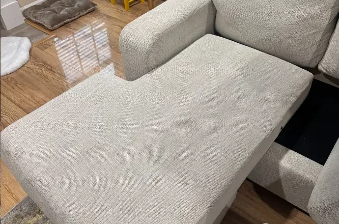 Fabric chaise lounge with pet stains fully removed after steam cleaning in Adelaide